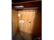 A small closet with built in shelving and an overhead light, perfect for storage at 4623 Monmouth Dr, Charlotte, NC 28269