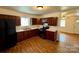 Functional kitchen with dark wood cabinetry, modern appliances, and tile flooring at 4623 Monmouth Dr, Charlotte, NC 28269