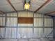 An unfinished shed interior with a peg board on the back wall at 4623 Monmouth Dr, Charlotte, NC 28269