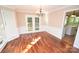 Dining room boasts hardwood floors, chandelier, chair rail and lots of natural light at 4704 Beech Crest Pl, Charlotte, NC 28269