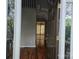 Welcoming entryway showcasing hardwood floors, a chandelier, and an open view into other living spaces at 4704 Beech Crest Pl, Charlotte, NC 28269