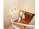 View of the home's foyer with hardwood floors, a light fixture, and a staircase at 4704 Beech Crest Pl, Charlotte, NC 28269