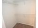 A walk-in closet with white walls and wire shelving provides ample storage space at 4704 Beech Crest Pl, Charlotte, NC 28269