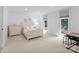 Bright bedroom with neutral carpet, a large window, and classic furnishings offering a serene space at 4931 Pine Ridge Rd, Charlotte, NC 28226