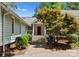 Inviting front entrance with a red door, complemented by a beautifully landscaped walkway and garden at 4931 Pine Ridge Rd, Charlotte, NC 28226