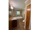Well-lit bathroom features a soaking tub, granite countertop vanity, and tile floor at 5119 Beckford Dr, Charlotte, NC 28226