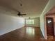 Bright living room featuring hardwood floors and large windows at 5119 Beckford Dr, Charlotte, NC 28226