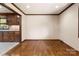 Light-filled dining room features wood flooring, wood trim and accents, and granite countertops at 5303 Rogers Rd, Monroe, NC 28110
