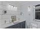 Bright bathroom features double sinks, lots of mirror space, and a glass enclosed shower at 6035 Idlebrook Dr, Charlotte, NC 28212