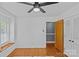 This versatile bedroom has hardwood floors and a window seat for additional natural light at 6035 Idlebrook Dr, Charlotte, NC 28212
