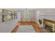 Spacious bedroom features hardwood floors, white dressers, and lots of natural light at 6035 Idlebrook Dr, Charlotte, NC 28212