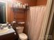 This efficient bathroom offers tile flooring and a shower/tub at 605 Brookside Dr, Monroe, NC 28110