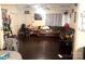 Bright living room with hardwood floors, neutral walls, and plenty of space for the whole Gathering at 605 Brookside Dr, Monroe, NC 28110