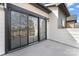 A covered balcony with large sliding glass doors for natural light and views at 714 Falling Oak Aly # 18, Huntersville, NC 28078
