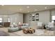 Cozy living room with stylish furnishings, recessed lighting, and wood floors at 714 Falling Oak Aly # 18, Huntersville, NC 28078