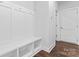 Mudroom area complete with storage, hooks, and a built-in bench, providing practical organization at 714 Falling Oak Aly # 18, Huntersville, NC 28078
