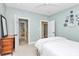 Bright bedroom with pastel walls, doorway view, and an array of decorative plates at 729 Lochaven Rd, Waxhaw, NC 28173