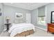 Relaxing bedroom featuring a neutral color scheme, soft lighting, and a view of the outdoors at 729 Lochaven Rd, Waxhaw, NC 28173