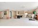 Large, carpeted game room with a pool table and a unique, partially-covered entrance at 729 Lochaven Rd, Waxhaw, NC 28173
