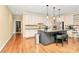 Well-equipped kitchen featuring stainless steel appliances, custom cabinets, and center island at 729 Lochaven Rd, Waxhaw, NC 28173