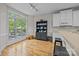 Bright breakfast nook with hardwood floors and a view of the outdoor seating area at 7815 Scottsburg Ct, Mint Hill, NC 28227