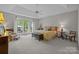 Spacious bedroom features large window, trey ceiling, and neutral colors at 7815 Scottsburg Ct, Mint Hill, NC 28227