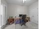 Office features large window, neutral colors, and built-in desk at 7815 Scottsburg Ct, Mint Hill, NC 28227