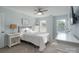 Comfortable bedroom featuring neutral paint, a ceiling fan, and abundant natural light from the windows at 8014 Avanti Dr, Marvin, NC 28173