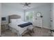 A comfortable bedroom with neutral colored walls and a ceiling fan for temperature control at 8014 Avanti Dr, Marvin, NC 28173