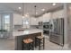 Well-equipped kitchen with granite countertops, stainless steel appliances, and a center island at 8014 Avanti Dr, Marvin, NC 28173