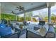 Inviting covered patio with ample seating and ceiling fans, perfect for outdoor relaxation and entertaining at 8014 Avanti Dr, Marvin, NC 28173