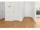 Bright foyer with wood-look flooring, a large closet, and access to various rooms at 817 Sardis Cove Dr, Charlotte, NC 28270