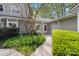 Charming front entrance with a well-manicured garden and inviting walkway, showcasing curb appeal at 817 Sardis Cove Dr, Charlotte, NC 28270