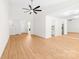 Expansive living room with modern flooring, open layout, and seamless flow to kitchen and dining areas at 817 Sardis Cove Dr, Charlotte, NC 28270