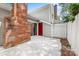 Patio featuring white privacy fence, brick chimney and sliding door entry to the home at 817 Sardis Cove Dr, Charlotte, NC 28270