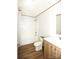 Bathroom with a tub-shower combination, toilet, sink with vanity, and wood-look flooring at 828 Long Bow Rd, Salisbury, NC 28144