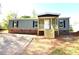 Charming single story home featuring a welcoming porch and a classic color scheme at 828 Long Bow Rd, Salisbury, NC 28144