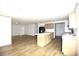 Bright kitchen featuring an island, hard surface floors, and modern appliances at 828 Long Bow Rd, Salisbury, NC 28144