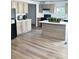 Modern kitchen boasts stylish cabinets, a center island, and sleek appliances at 828 Long Bow Rd, Salisbury, NC 28144