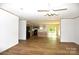 Open floor plan featuring hard surface floors, black appliances, and bright lighting at 828 Long Bow Rd, Salisbury, NC 28144