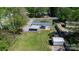 Aerial view of the property featuring a large lot and fenced yard with plenty of space at 8705 Carroll St, Hickory, NC 28601