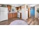 Cozy kitchen featuring wood cabinets, laminate countertops, and modern appliances at 8705 Carroll St, Hickory, NC 28601