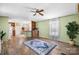 Open-concept living area with wood-look floors and a neutral color palette at 8705 Carroll St, Hickory, NC 28601