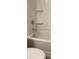 Bathroom with a bathtub and shower combination featuring built in shelves at 8820 First Run Ct, Charlotte, NC 28215