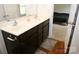 Bathroom featuring a double sink vanity and with storage and access to bedroom at 8820 First Run Ct, Charlotte, NC 28215