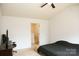 Bedroom with a ceiling fan and a desk area, offering a calm and inviting atmosphere at 8820 First Run Ct, Charlotte, NC 28215