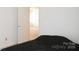 Bedroom with a door leading to another room at 8820 First Run Ct, Charlotte, NC 28215