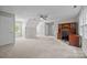 Spacious bonus room features neutral walls, carpet, a built-in desk, and natural light at 9000 Stourbridge Dr, Huntersville, NC 28078