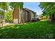 Beautiful home with lush lawn, mature trees and attached garage at 9000 Stourbridge Dr, Huntersville, NC 28078