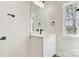 Bathroom featuring vanity, black plumbing fixtures and a window at 9165 Cherokee Dr, Hickory, NC 28601